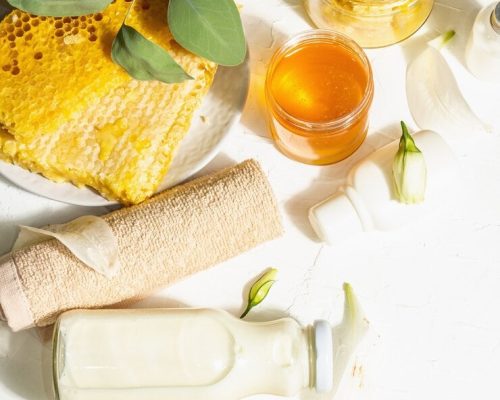 Spa Concept With Honey Milk Natural Cosmetics Organic Ingredients Hard Light Dark Shadow White Putty Background Top View 1...